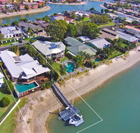 Coorumbong 16 - 5 BDRM Canal Home with Pool - Your Accommodation