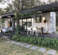 Absolute riverfront shipping container cabin - Your Accommodation