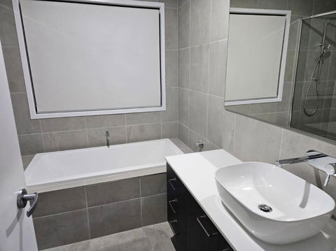 O Stylish 4 Room Oasis With 65 TV - Your Accommodation 1