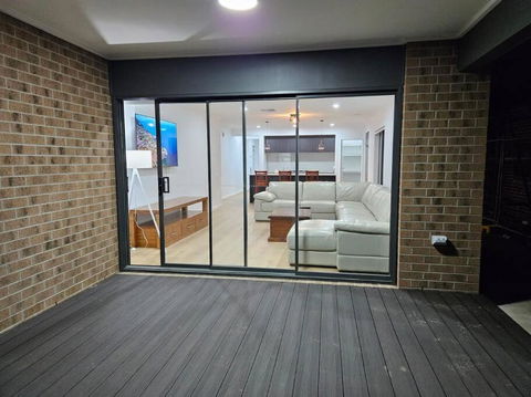 O Stylish 4 Room Oasis With 65 TV - Your Accommodation 3