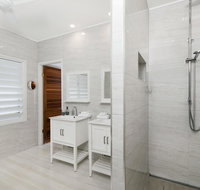 Bathers across the bay from Port Douglas - Your Accommodation